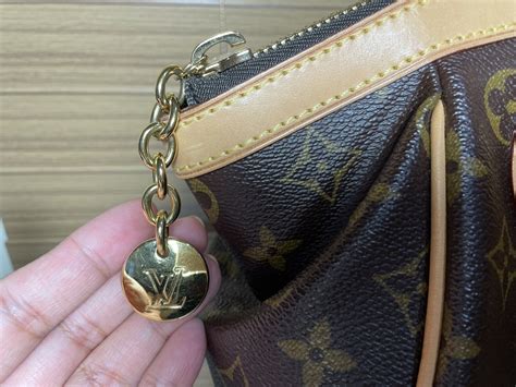 lv tivoli pm authentic|louis vuitton tivoli gm discontinued.